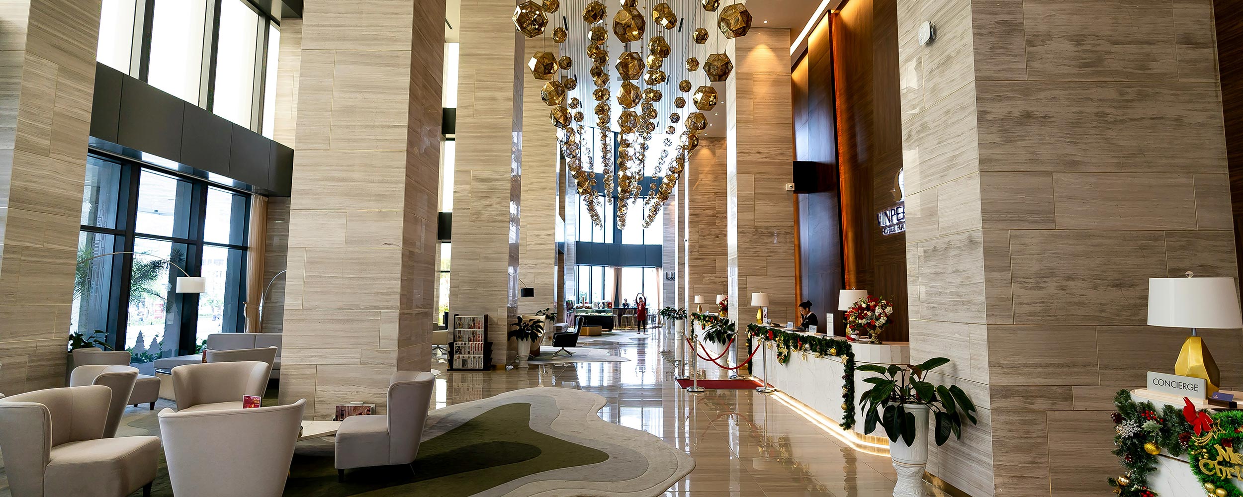 Luxurious commercial lobby with grand lighting fixtures and marble finishes