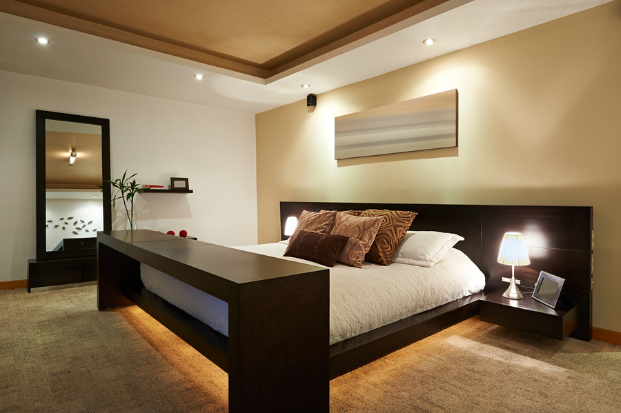 Image is of a bedroom with lighting design installed under the bed.